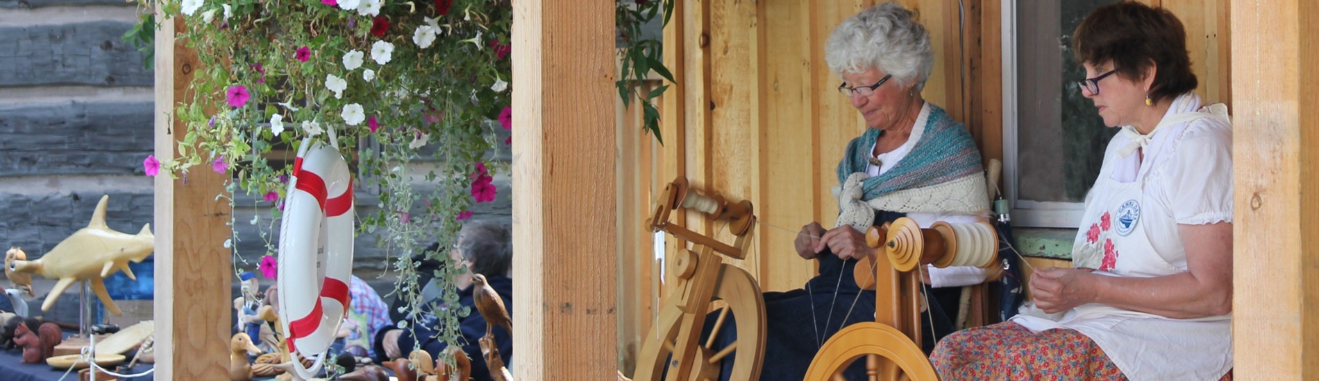 Spinners on weaving cabin porch